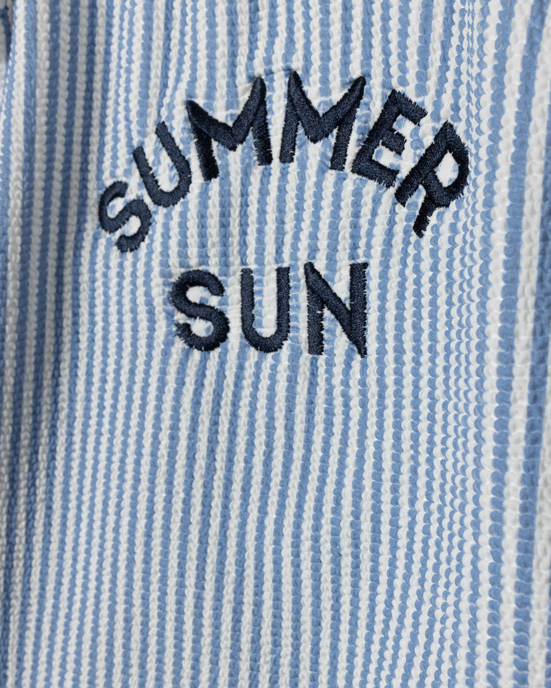 Seersucker Ruffle Trim Logo Swimsuit