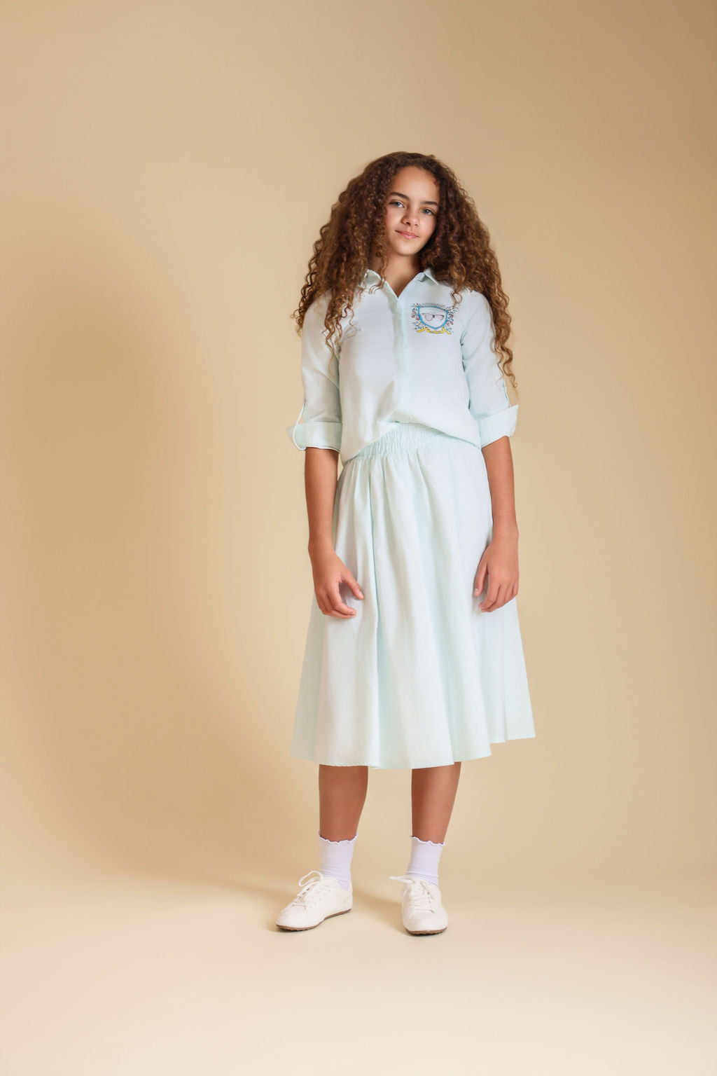 Pinstriped Butterfly Logo Blouse - Junees