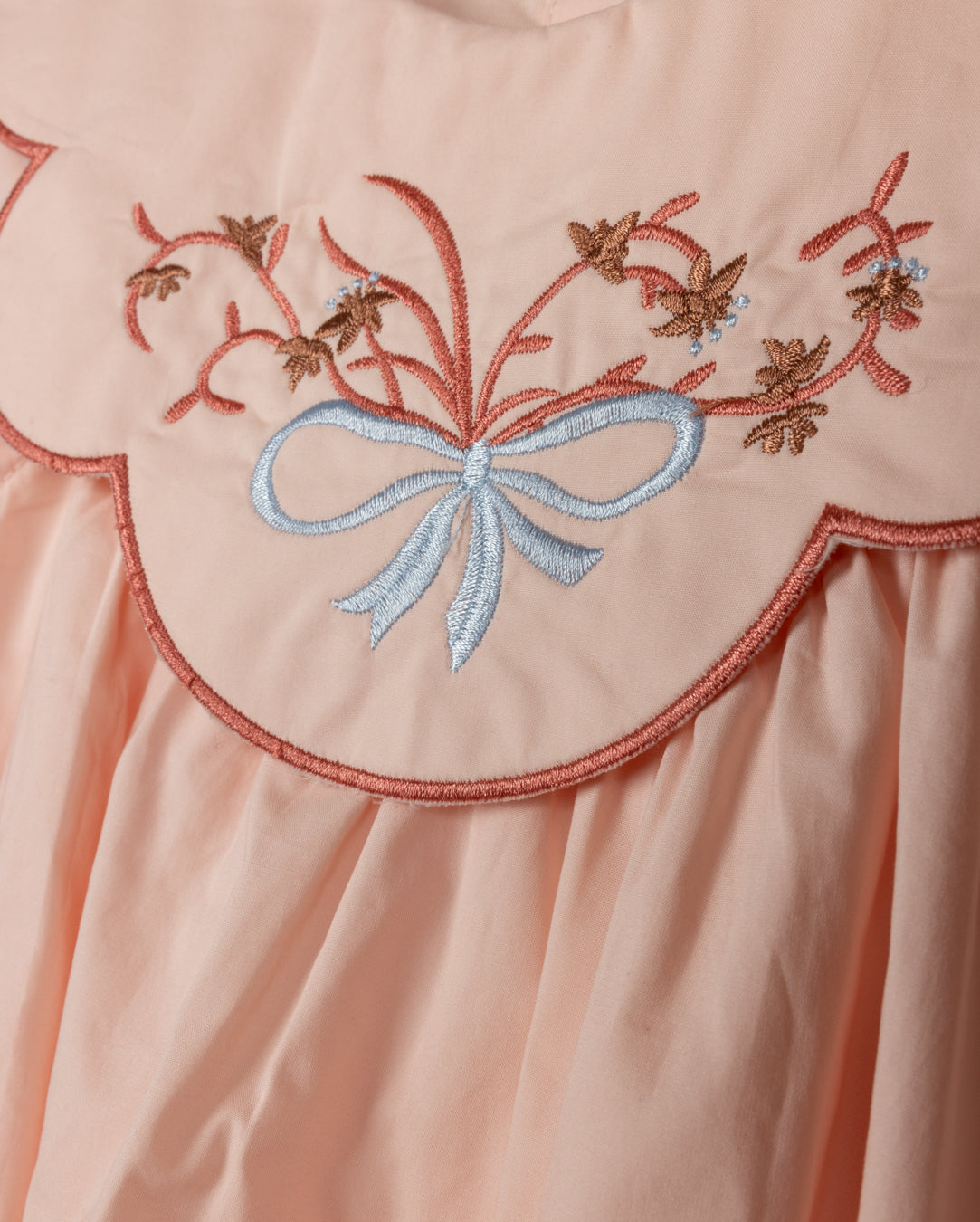 Embroidered Bow Detail Bib Romper