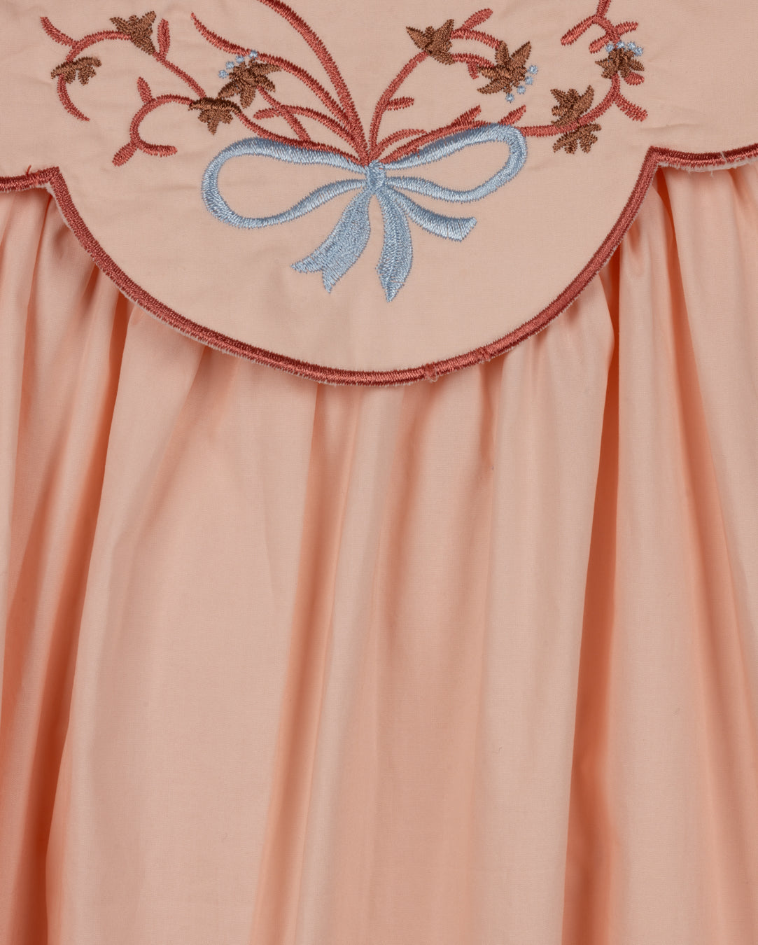Embroidered Bow Detail Bib Dress